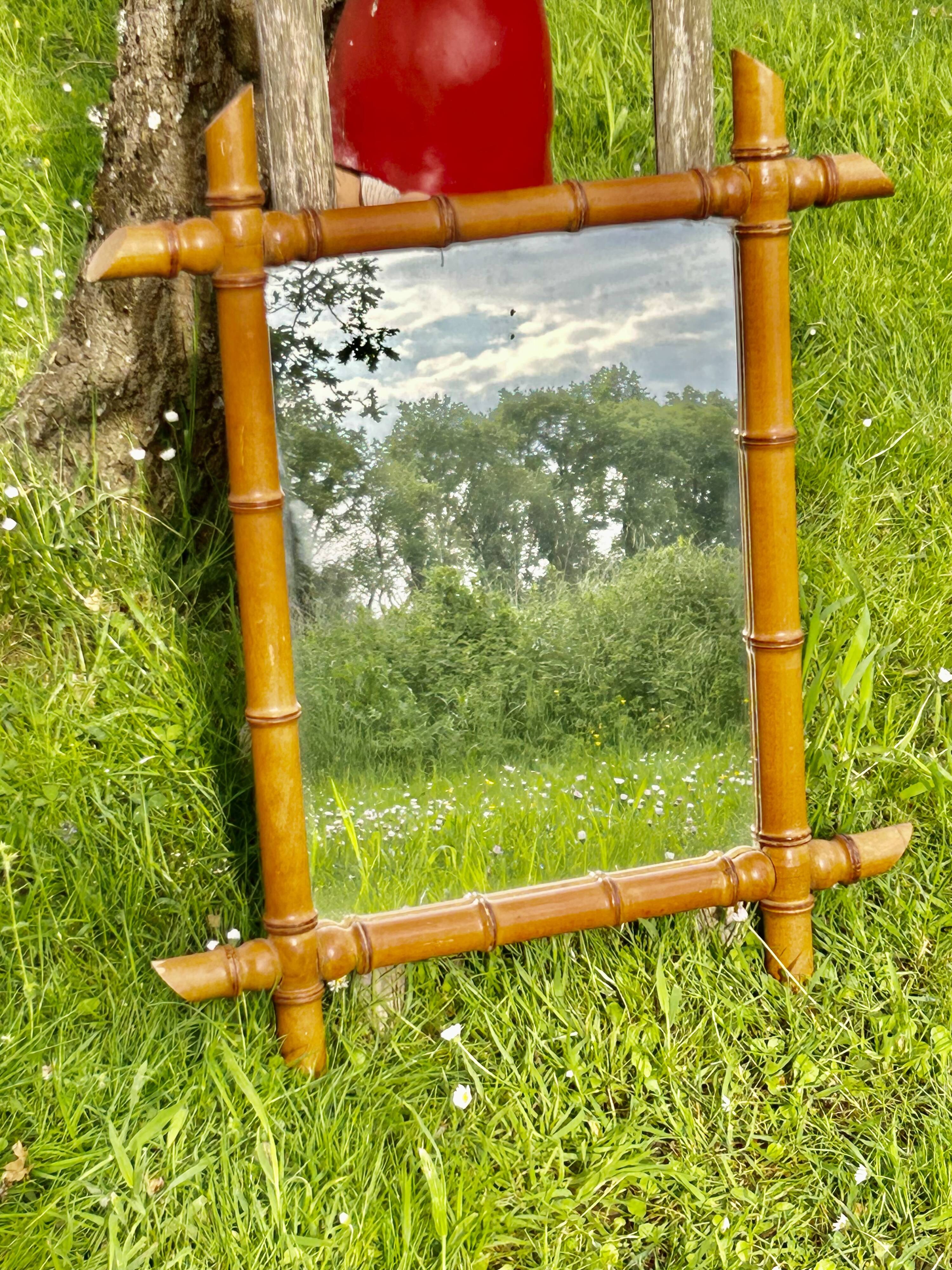 Large format for this type of faux bamboo mirror 70 cm.