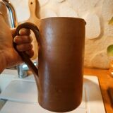 Duo of pitchers water, wine