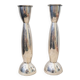 Pair of silver-colored metal candlesticks.