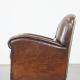 Sheep leather armchair with round shapes