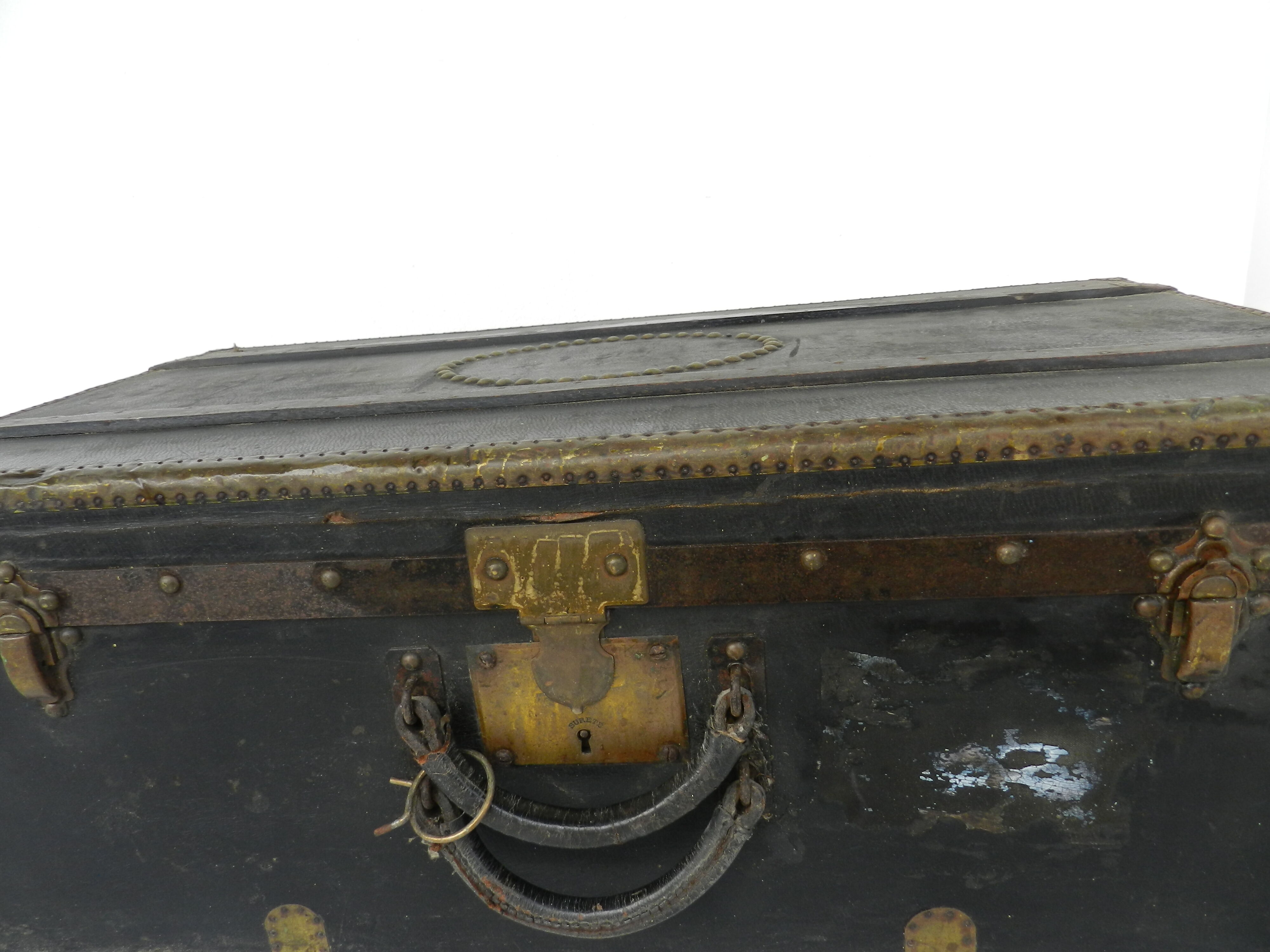 Old wooden, iron and brass trunk