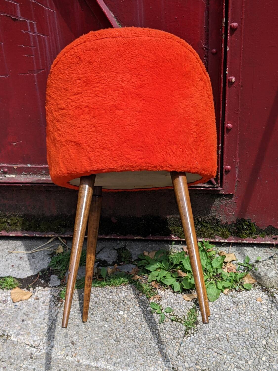 Orange furry barrel chair