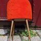 Orange furry barrel chair