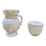 Pitcher and its glass in white earthenware from Malicorne