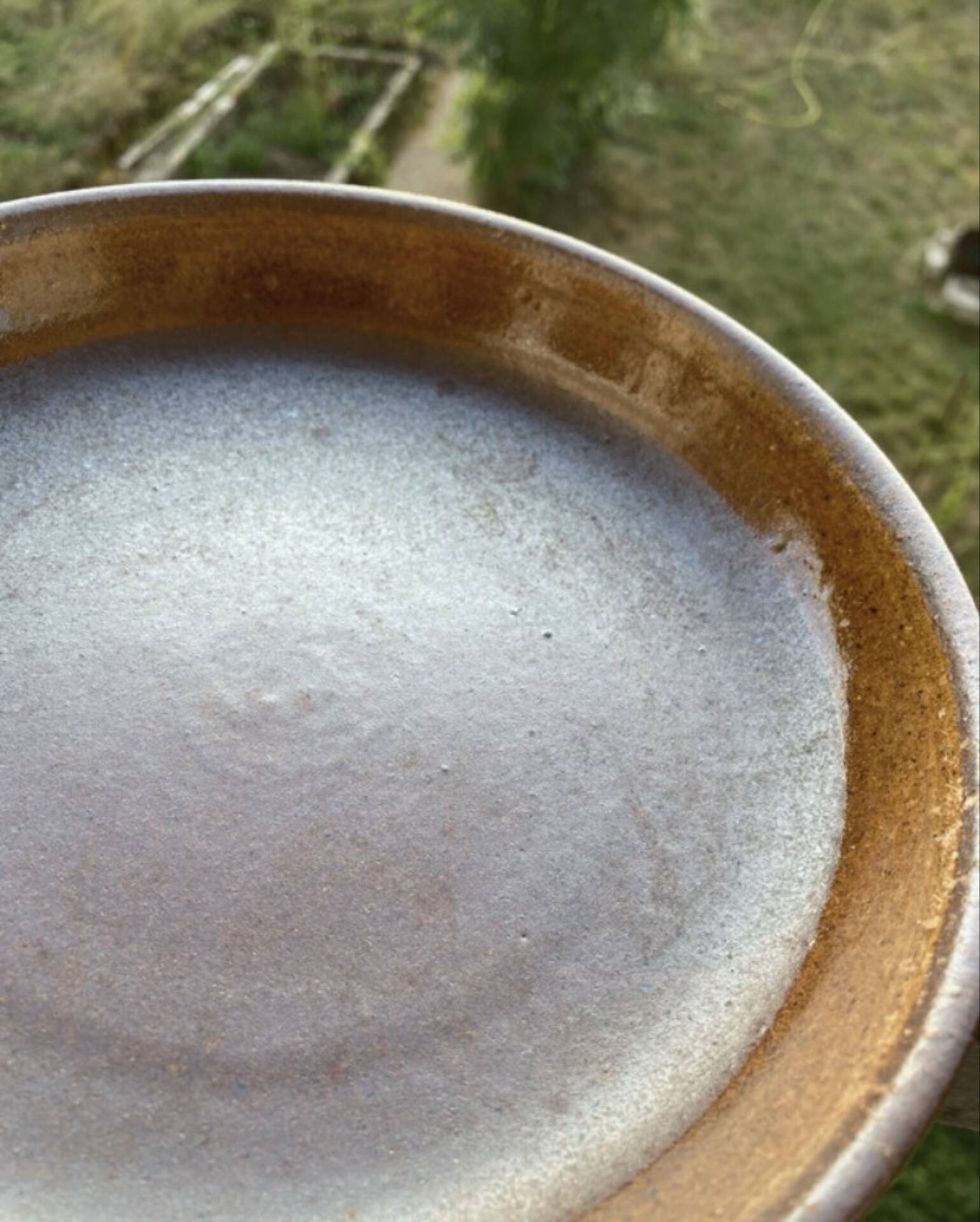 Deep plates made of organic, wild, earthy marsh clay.