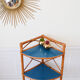 Rattan corner shelf