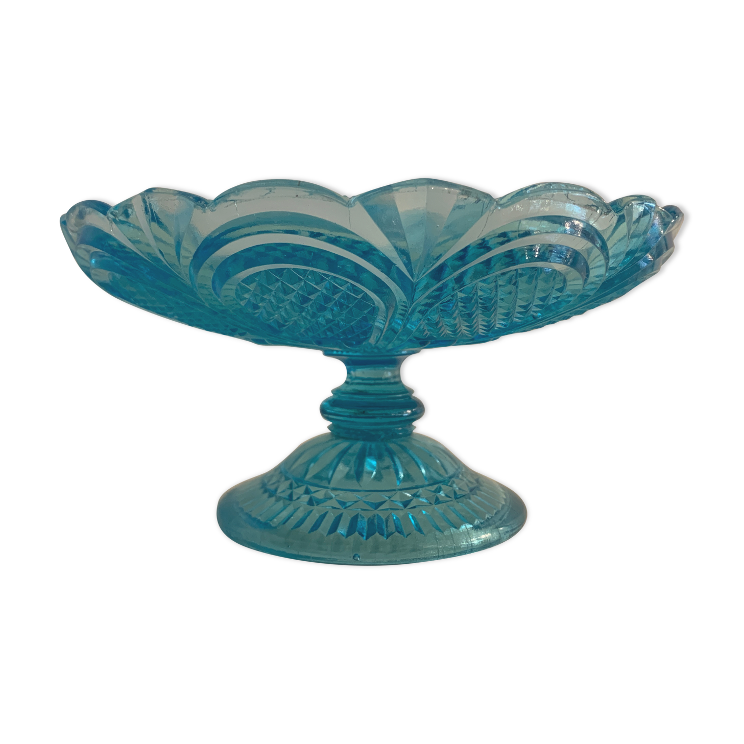 Fruit cup on blue-bubbled glass peder