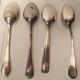 Set of mismatched silvered metal cutlery