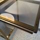 Brass rolling trolley with smoked glass from the 70s