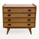 Vintage commode from the 1960s with tapered legs.