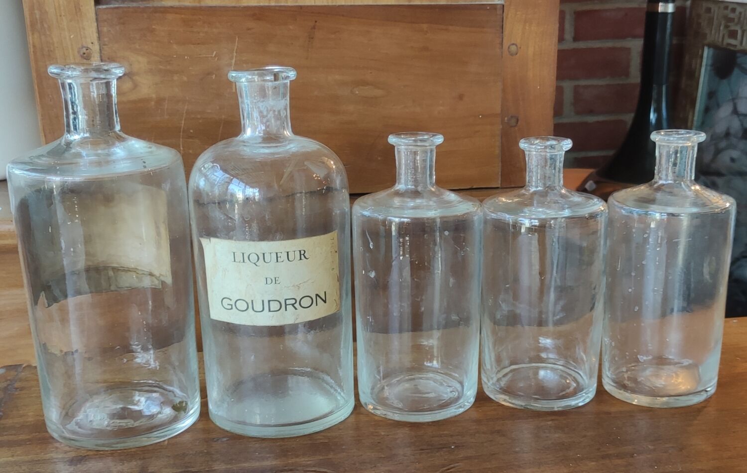 Series of 5 blown glass apothecary pharmacy bottles