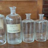 Series of 5 blown glass apothecary pharmacy bottles