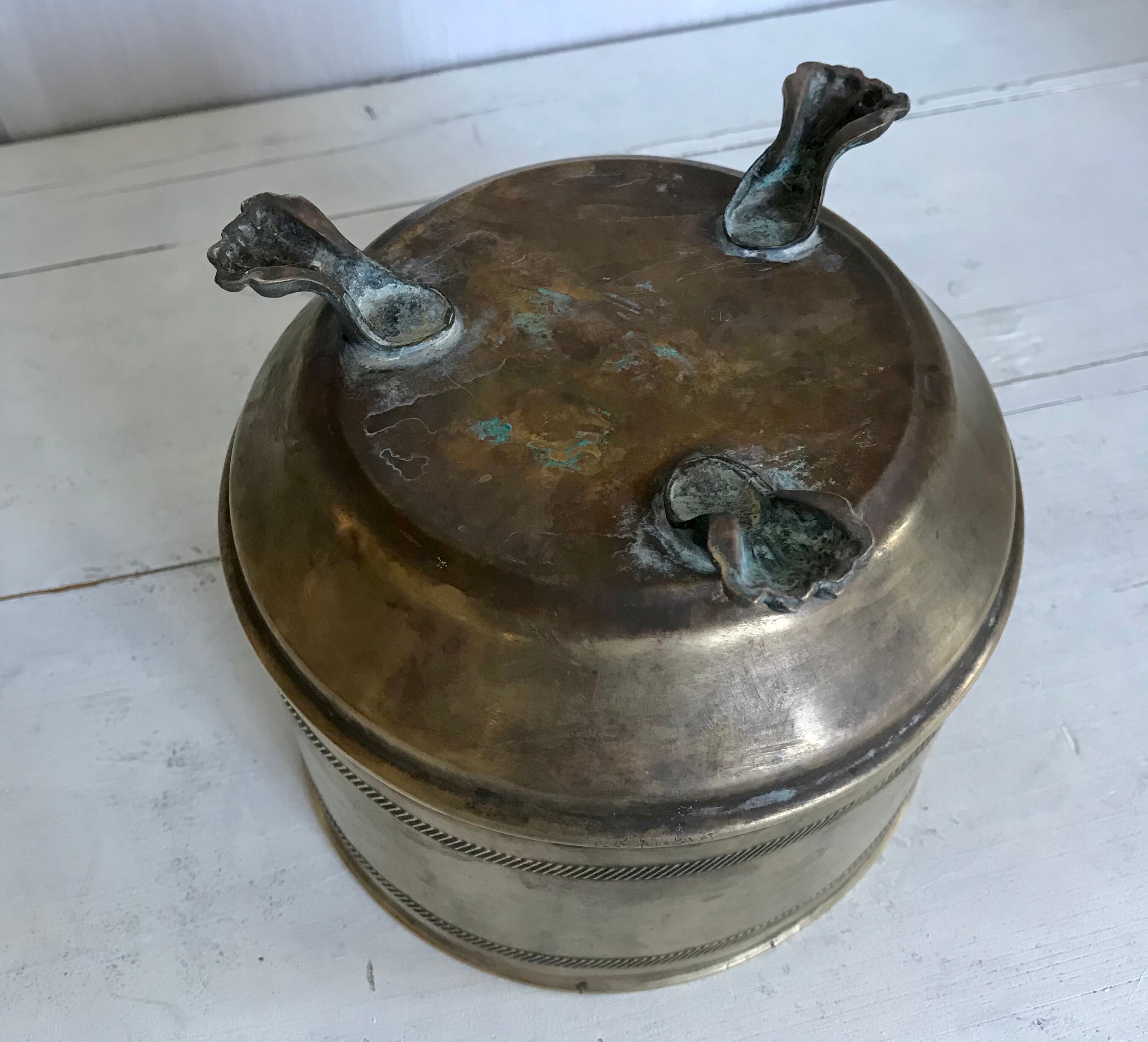 Former brass tripod pot