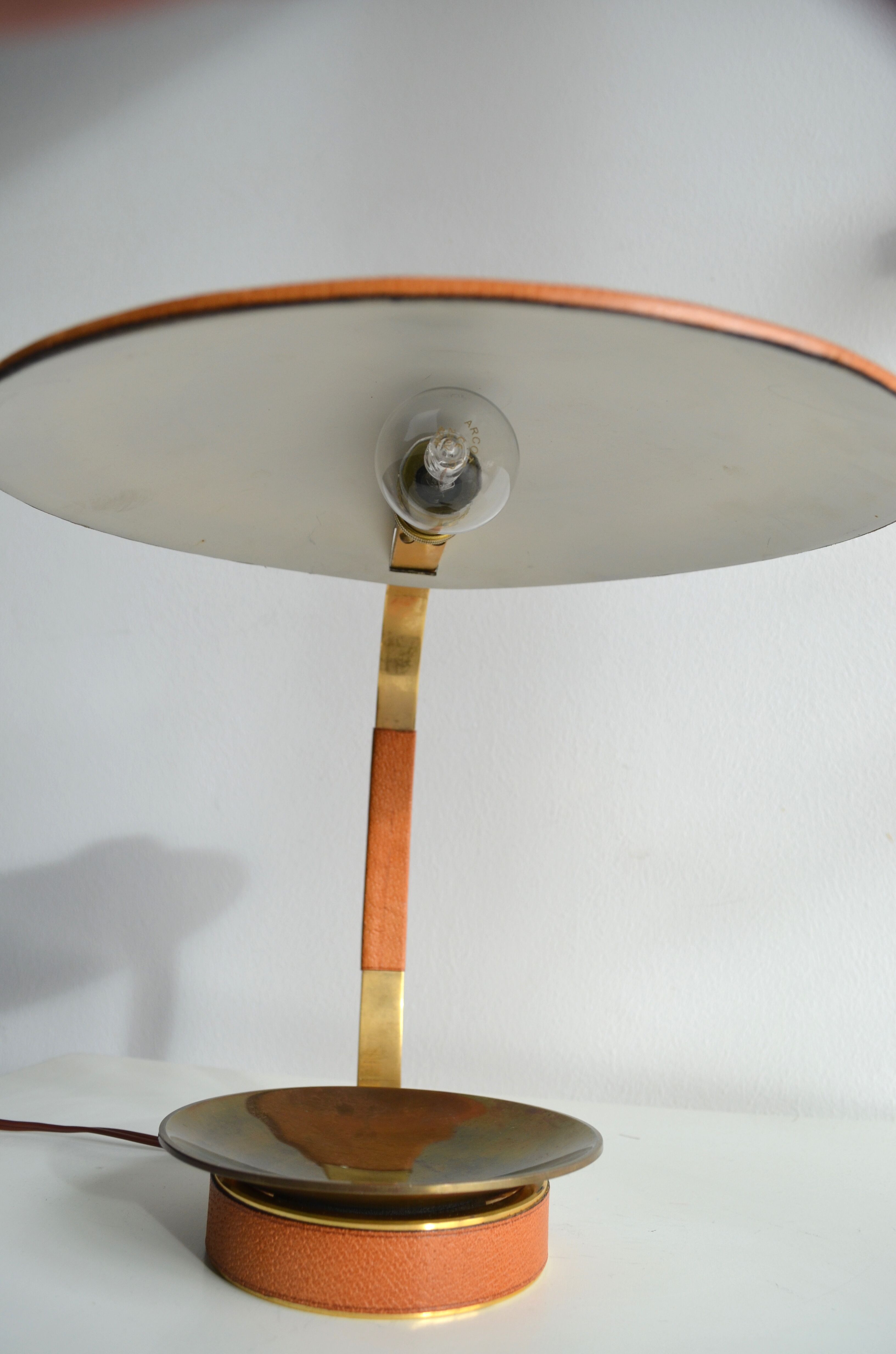 Leather and brass 70's lamp