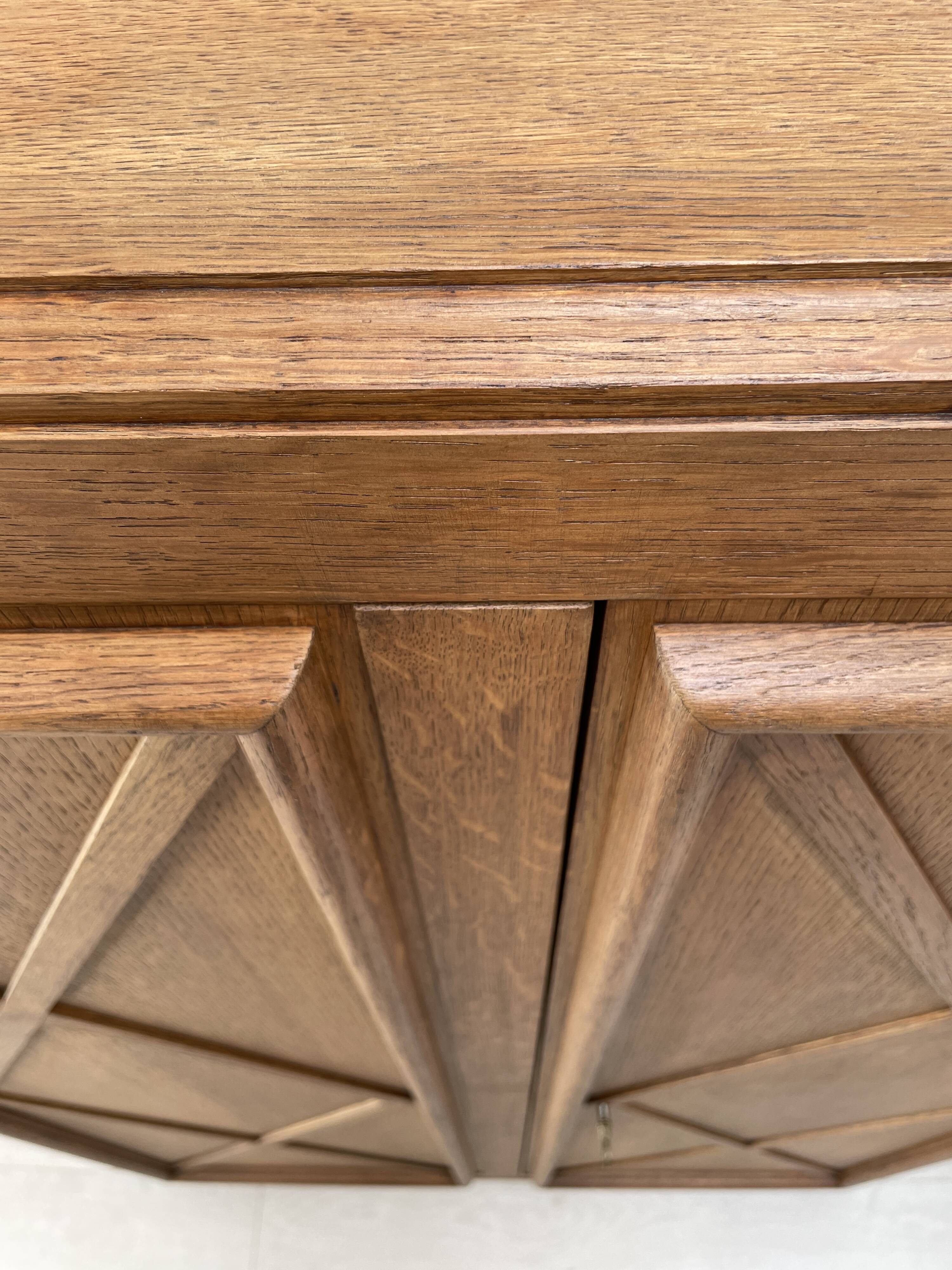 Storage unit in solid oak and veneer, circa 1960.