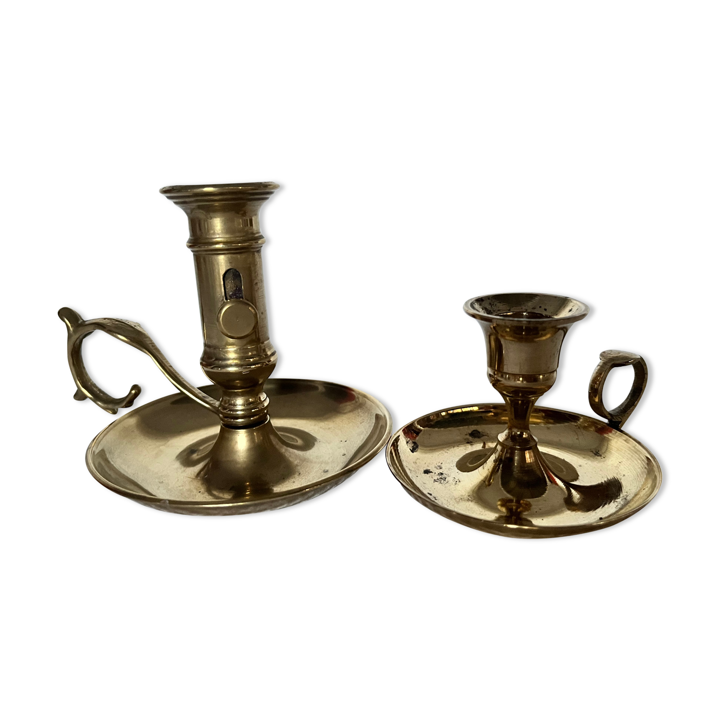 Duo of brass hand candle holders