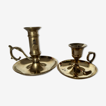 Duo of brass hand candle holders