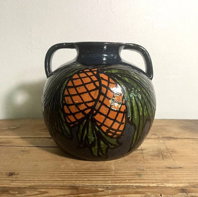 Glazed terracotta round vase