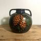 Glazed terracotta round vase
