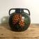 Glazed terracotta round vase