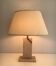 Travertine lamp with brass inlay
