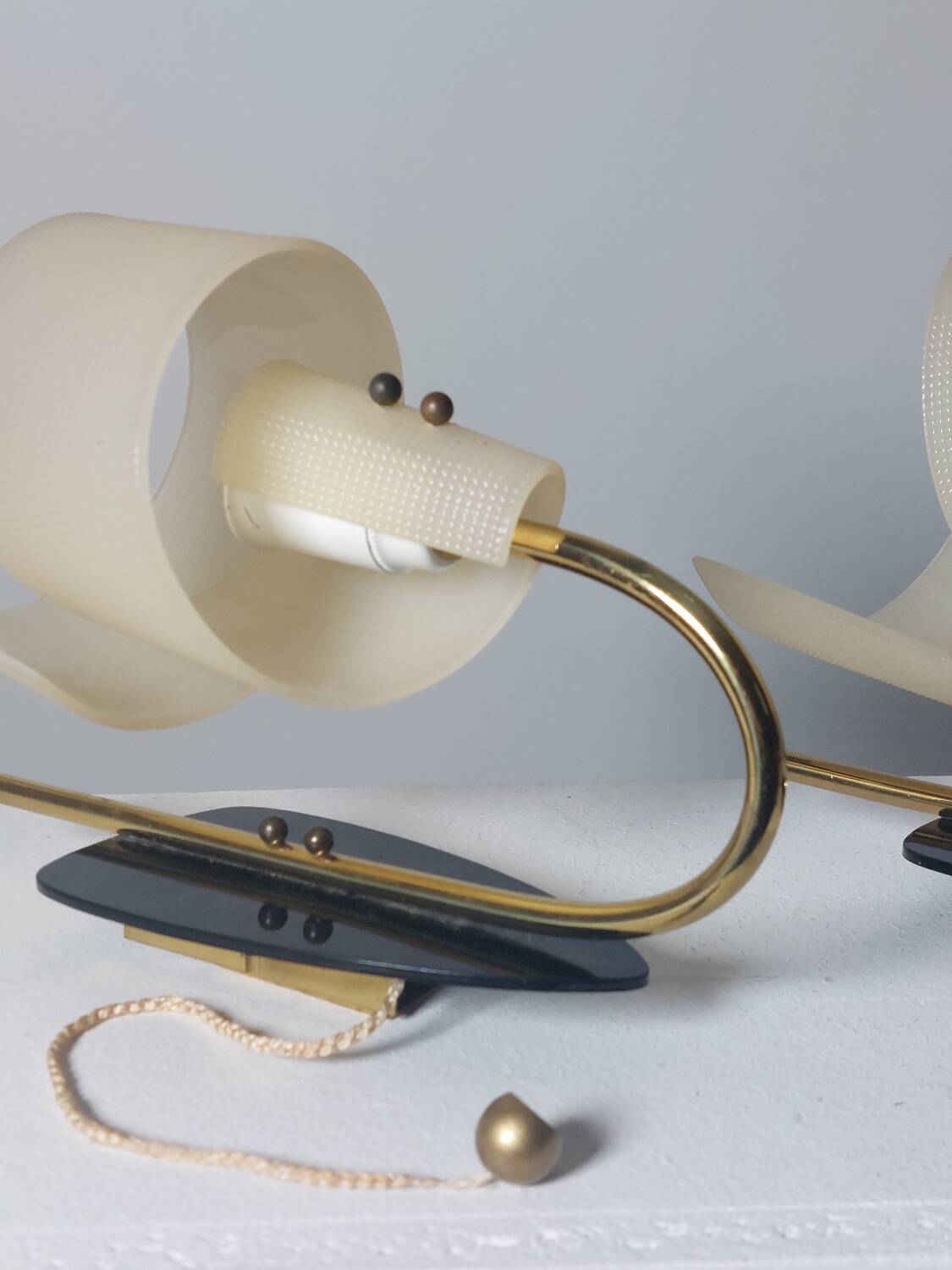 Pair of vintage wall lamps from the 1950s in brass.