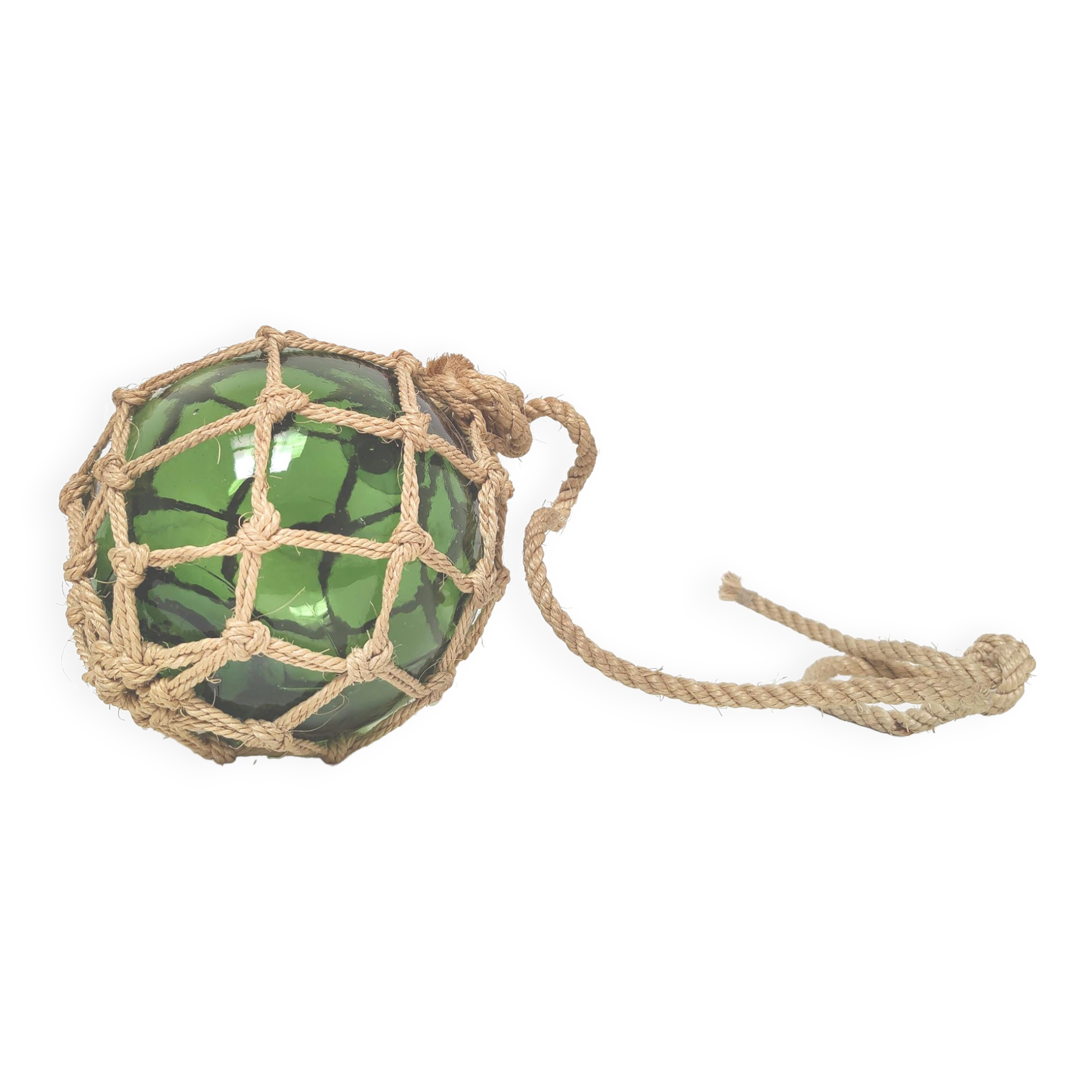 Green ball marine float in glass and rope