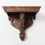 Carved wooden shelf