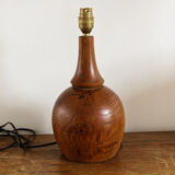 Pied de lampe en bois tourné signé