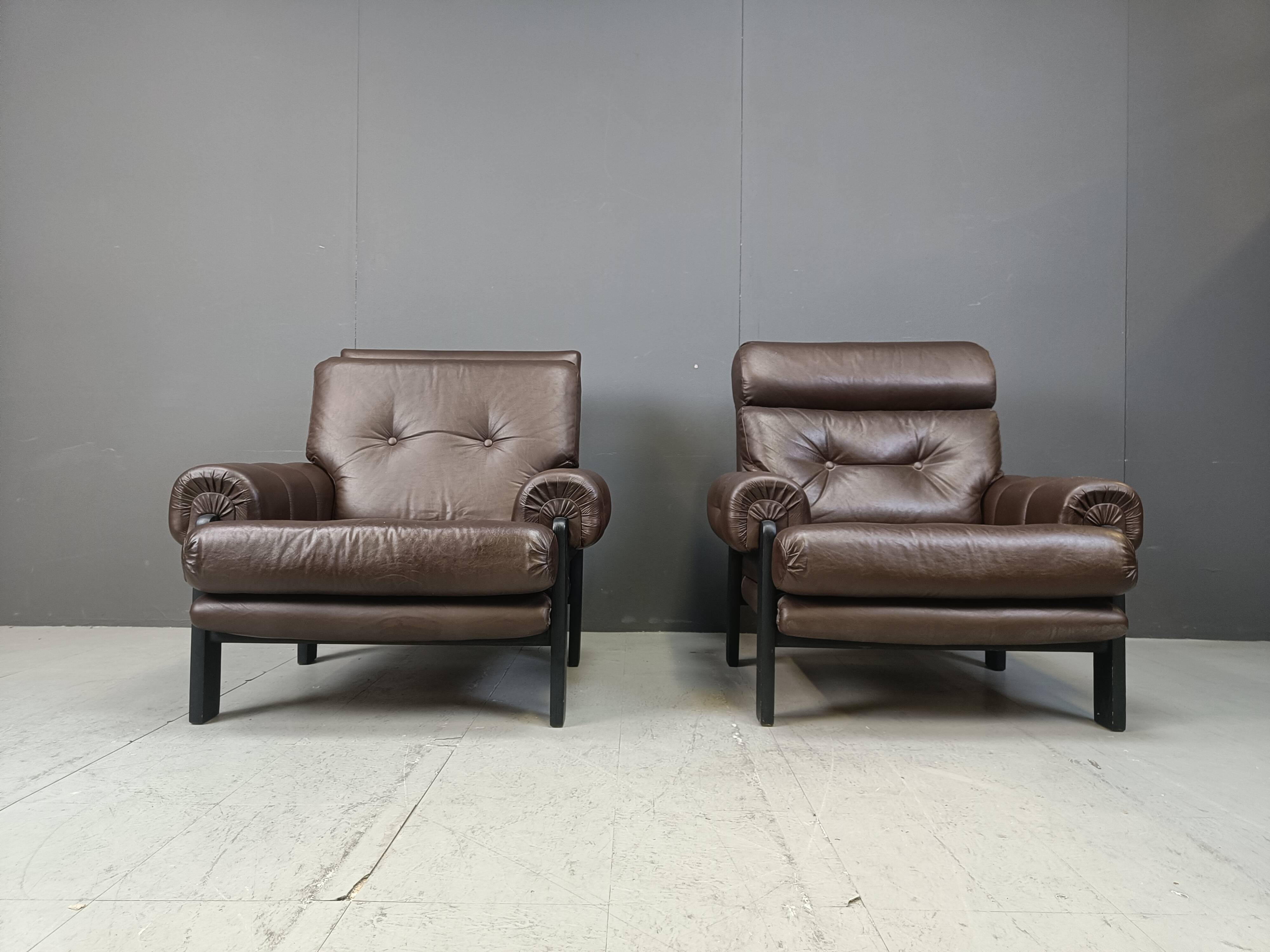 Pair of leather armchairs made in Denmark, 1960s
