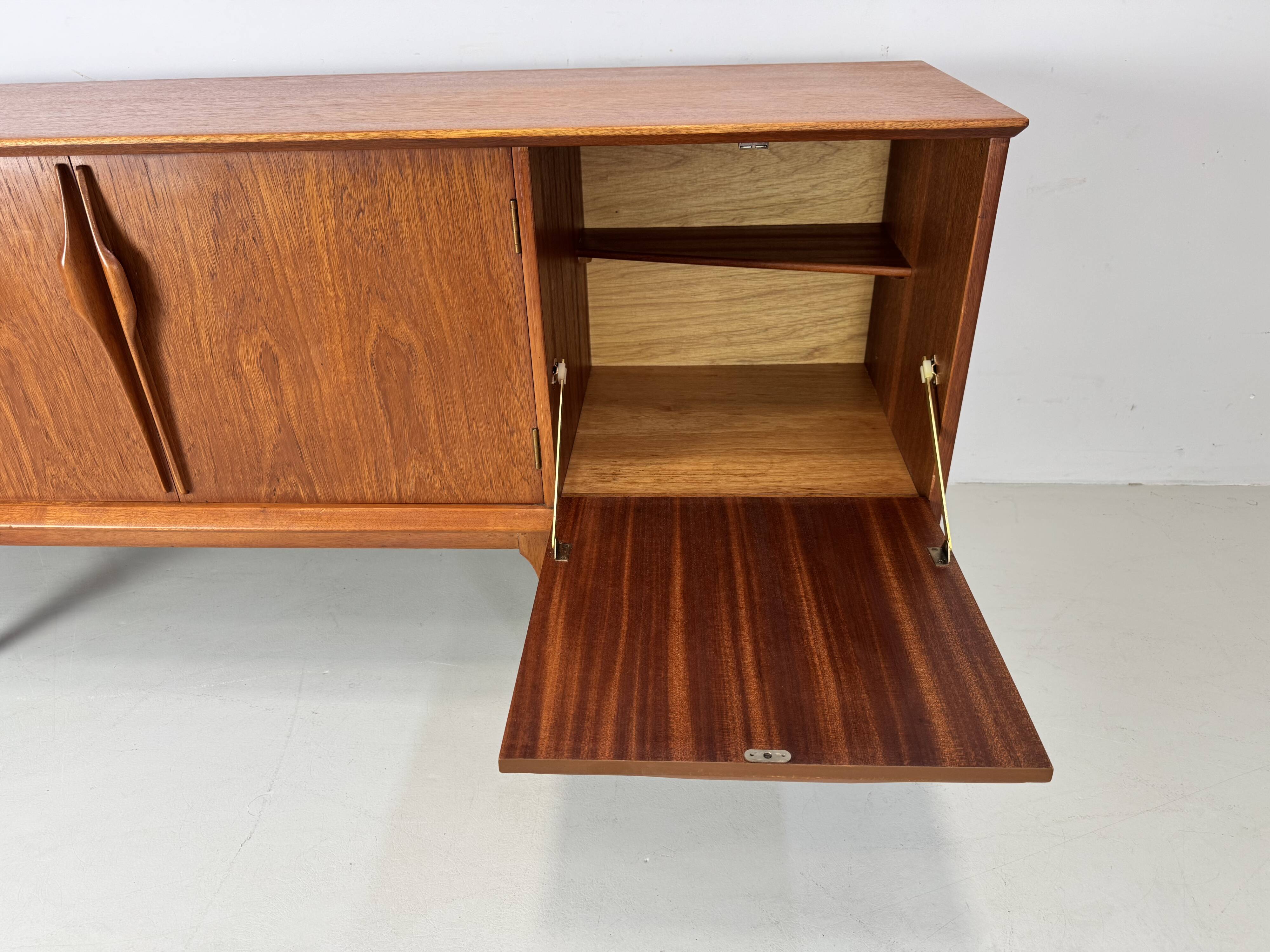 Vintage sideboard by Jentique from the 1960s .
