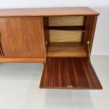 Vintage sideboard by Jentique from the 1960s .