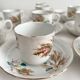 12 ironstone coffee cups with polychrome floral decoration, KG Lunéville