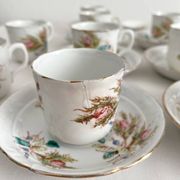 12 ironstone coffee cups with polychrome floral decoration, KG Lunéville