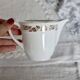 Vintage earthenware milk jug from Moulin des Loups – Gold floral motif