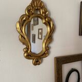 Golden mirror in baroque style.