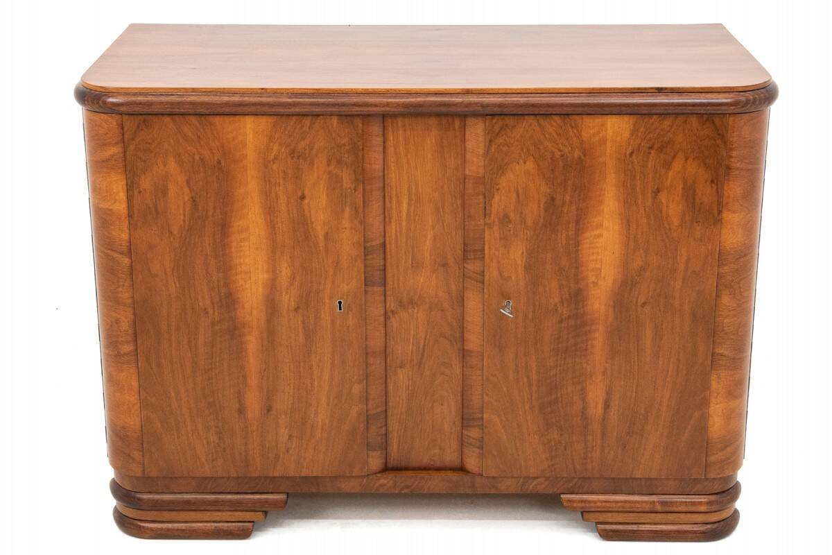 Art Deco style walnut chest of drawers, Poland, 1950s.