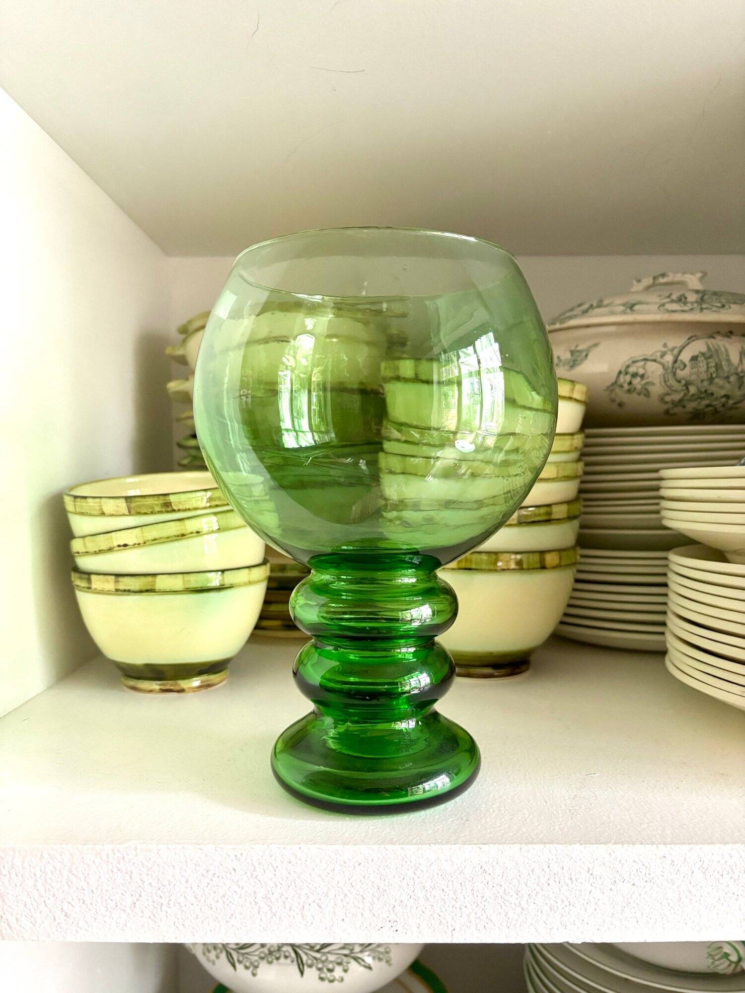 Green glass ball vase