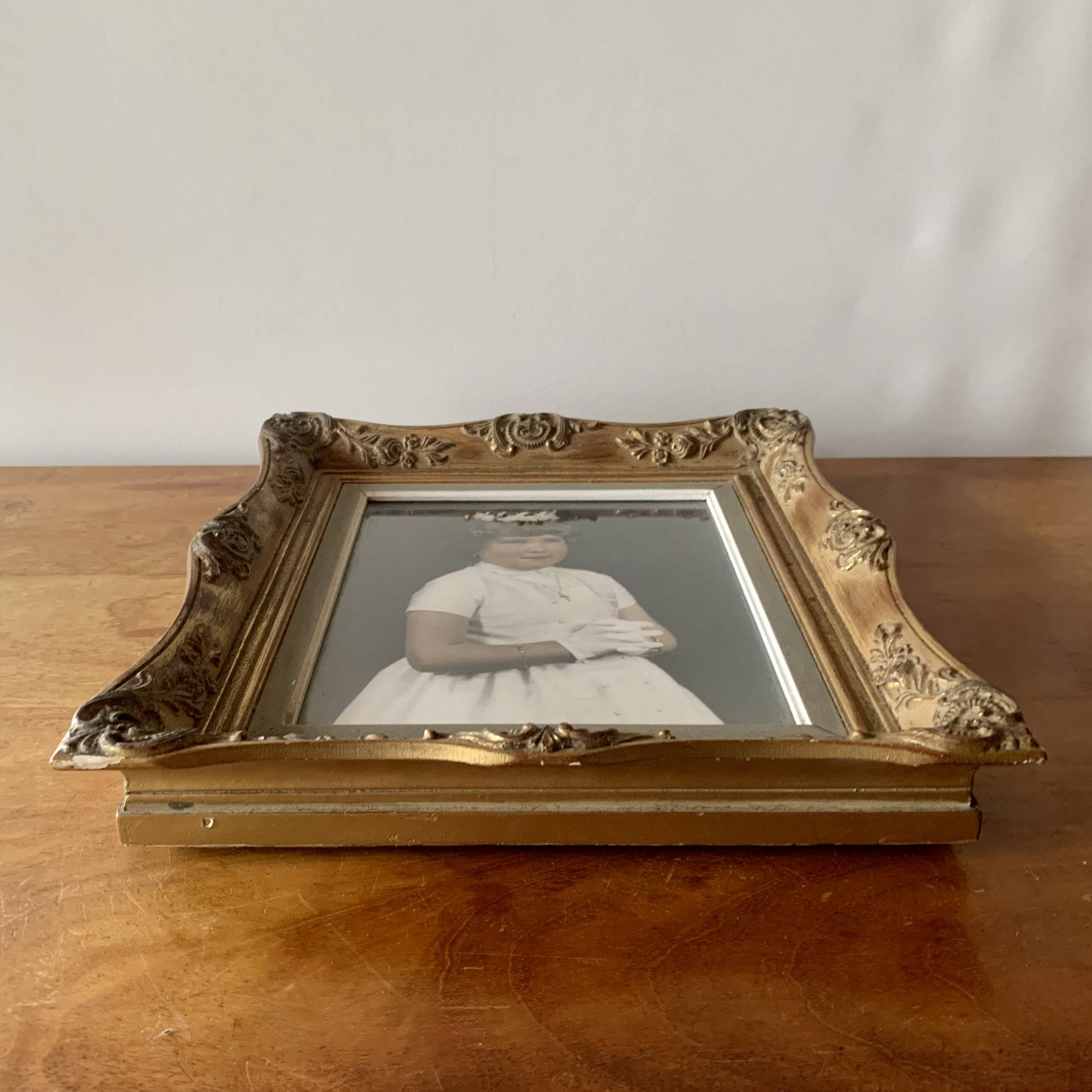 Old gilded carved wooden wall frame