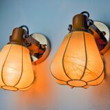 Pair of articulated "Cocoon" wall lights, resin and pine, Italy, 1970