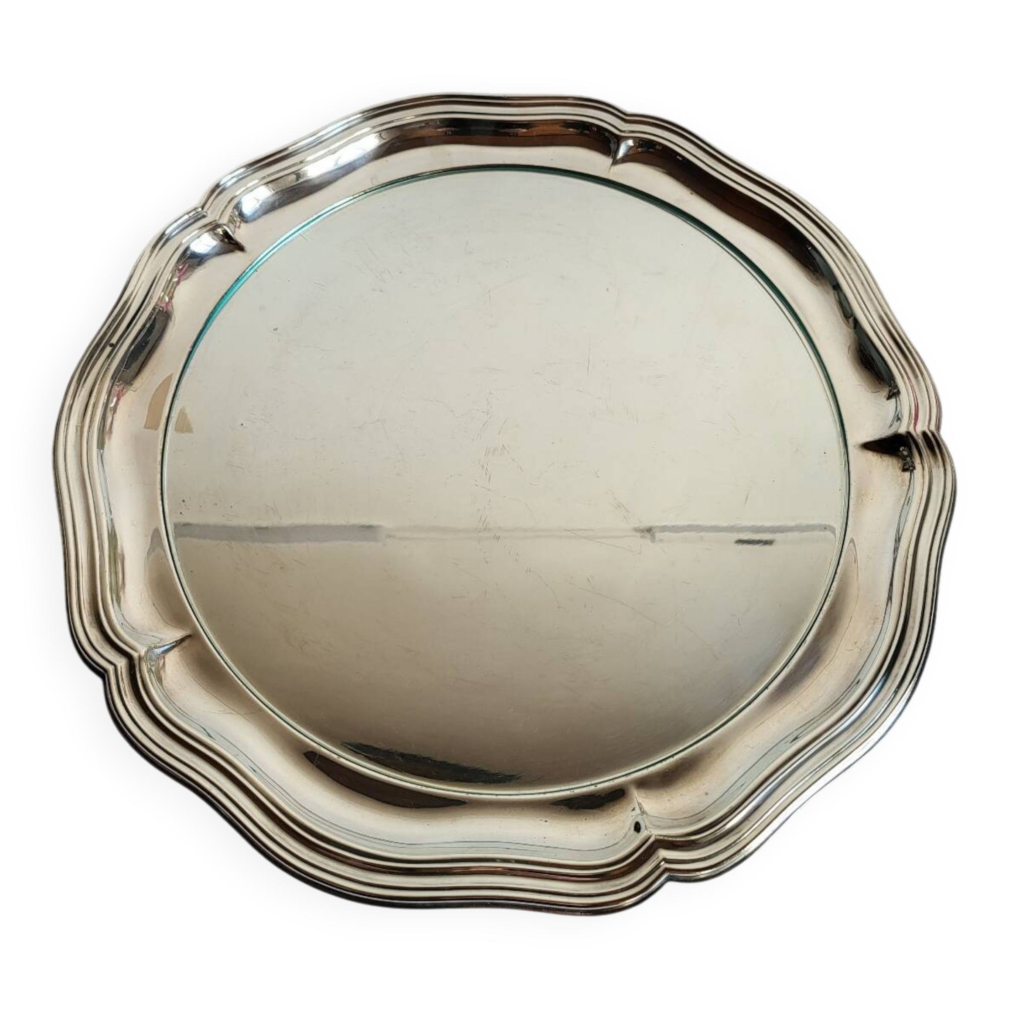 Round silver-plated serving dish with a glass base.