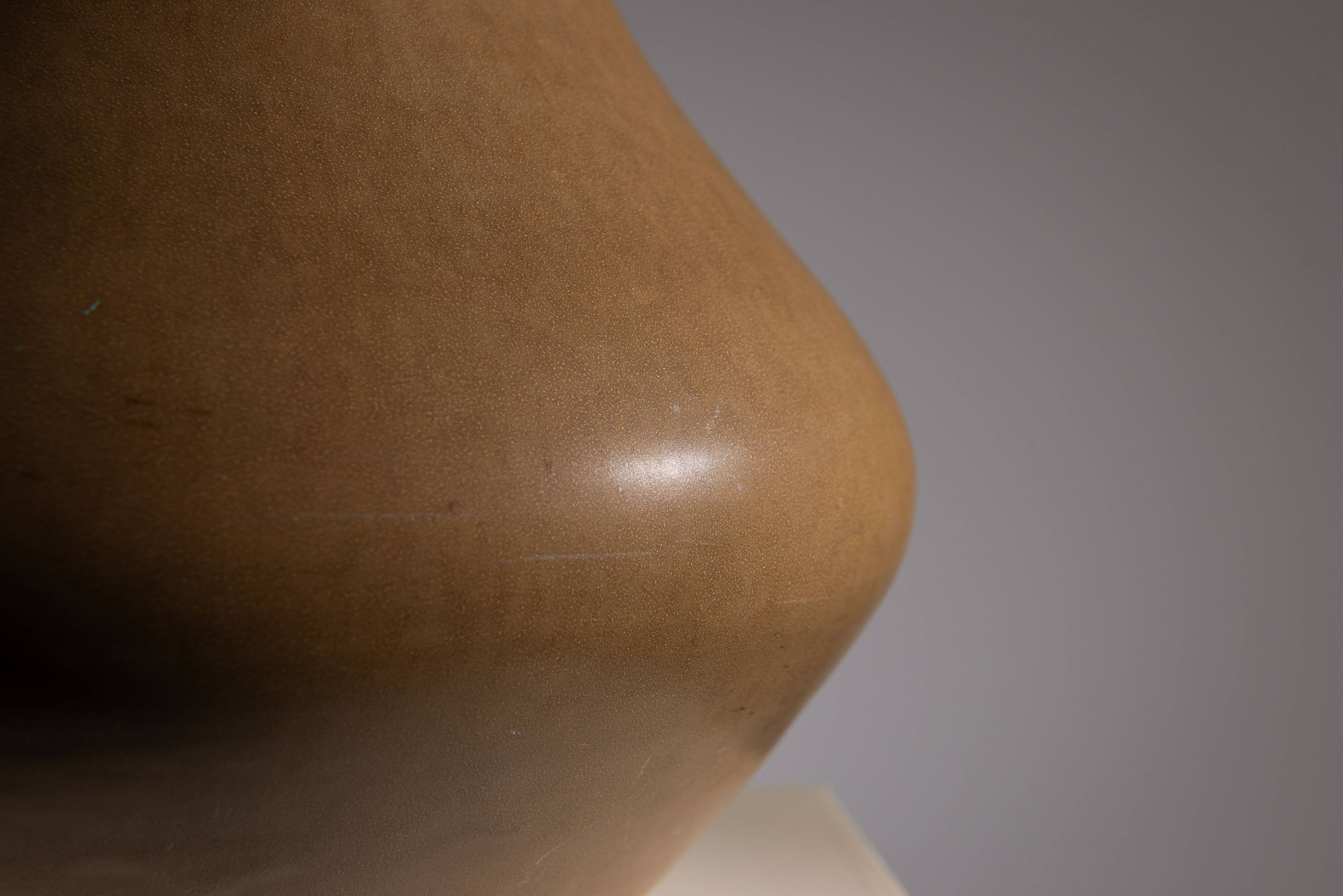 Minimalist curved stoneware vase in matte sand finish
