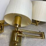 Two wall lights with articulated arm in gold metal Egolux