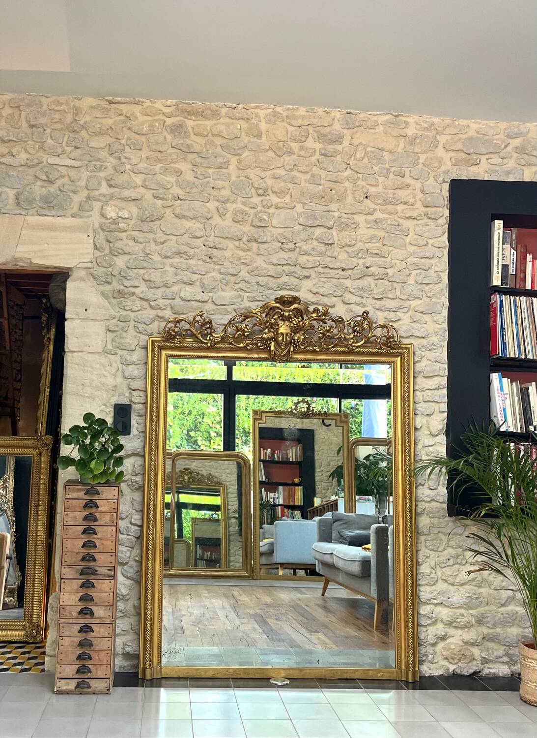 Pedimented mirror 184.5cm/135cm gilded with gold leaf