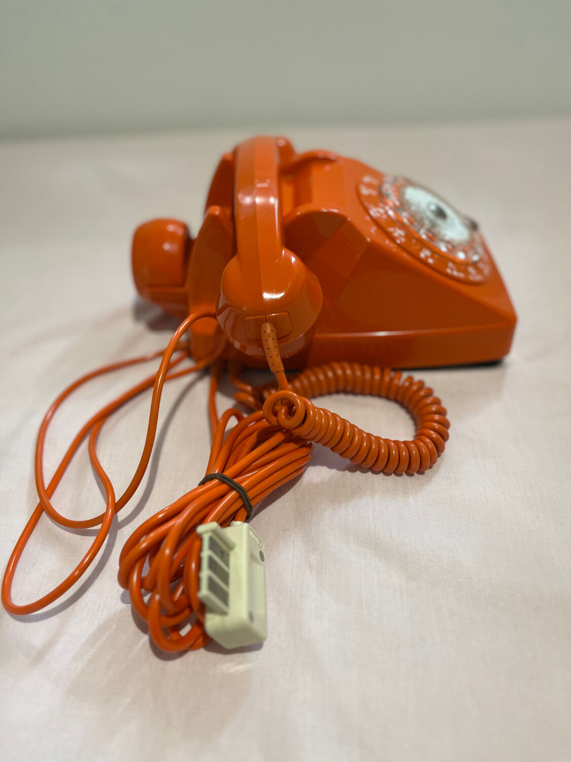 Orange vintage phone with socotel dial