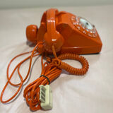 Orange vintage phone with socotel dial