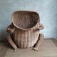 Frog in rattan magazine holder
