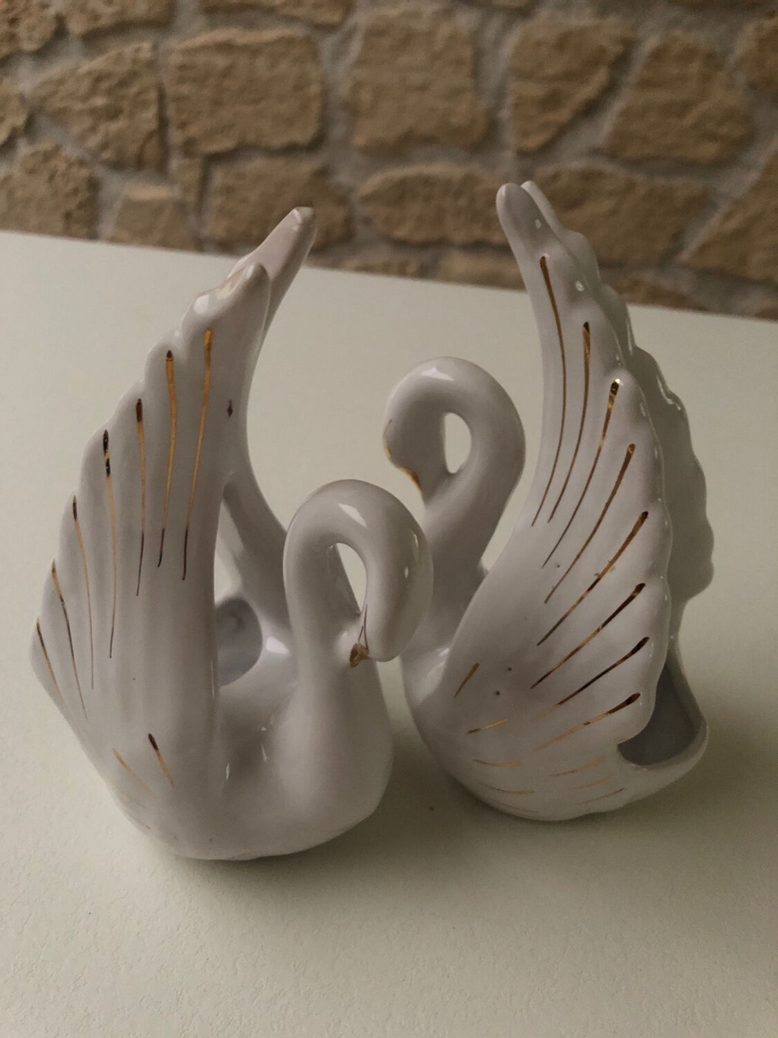 Pair of ceramic swans