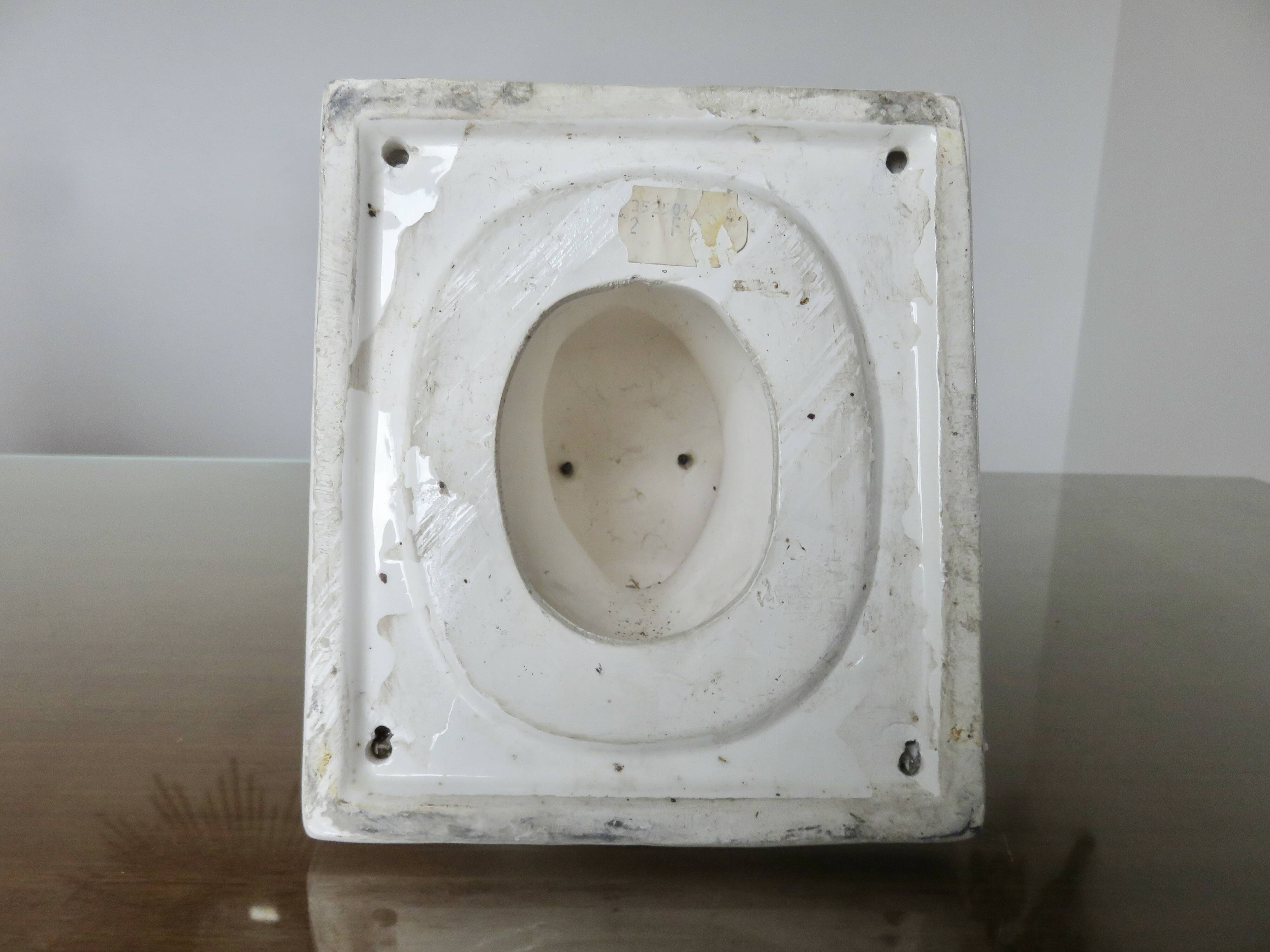 Stylized cow head in white ceramic, wall decoration from the 80s