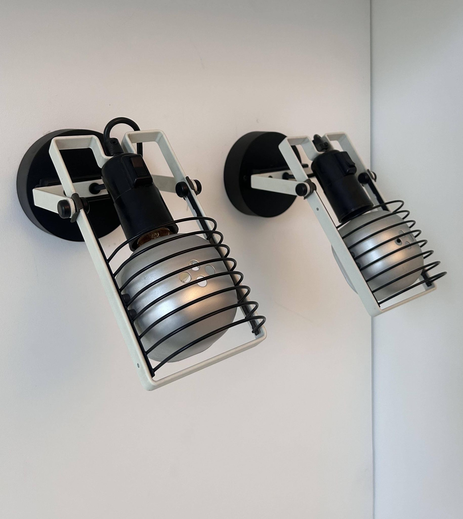 Pair of vintage Sintesi adjustable wall lights, by Gismonti for Artemide, Italy 1975